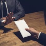 الرشوة تُسقط نائبًا للوكيل العام بمدينة فاس: بين زلزال الثقة وحتمية الإصلاح